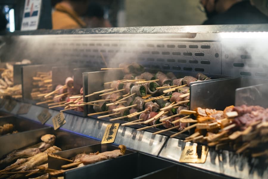 Skewers grilling at a street food stall