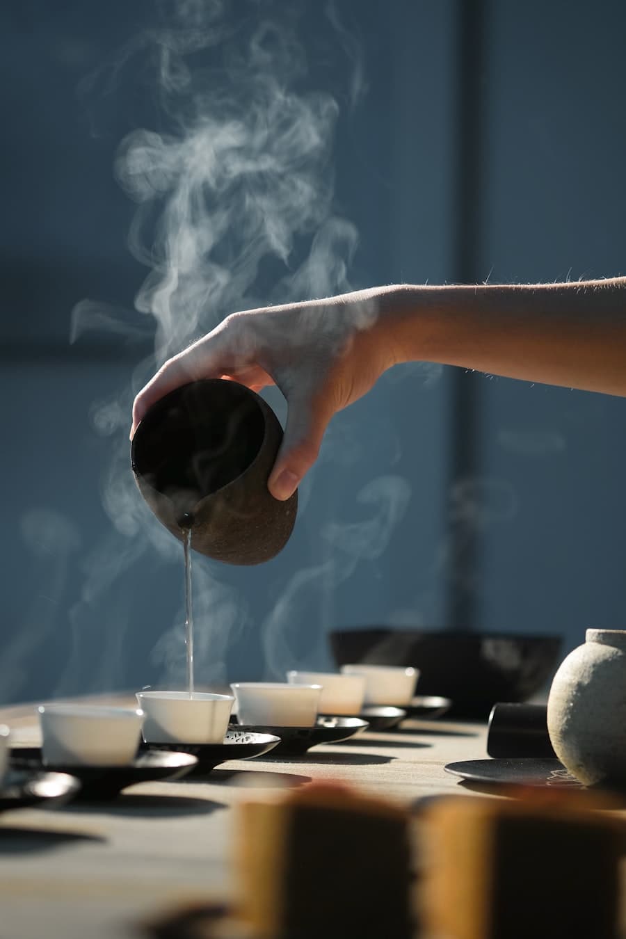 Tea being poured at a traditional tea ceremony